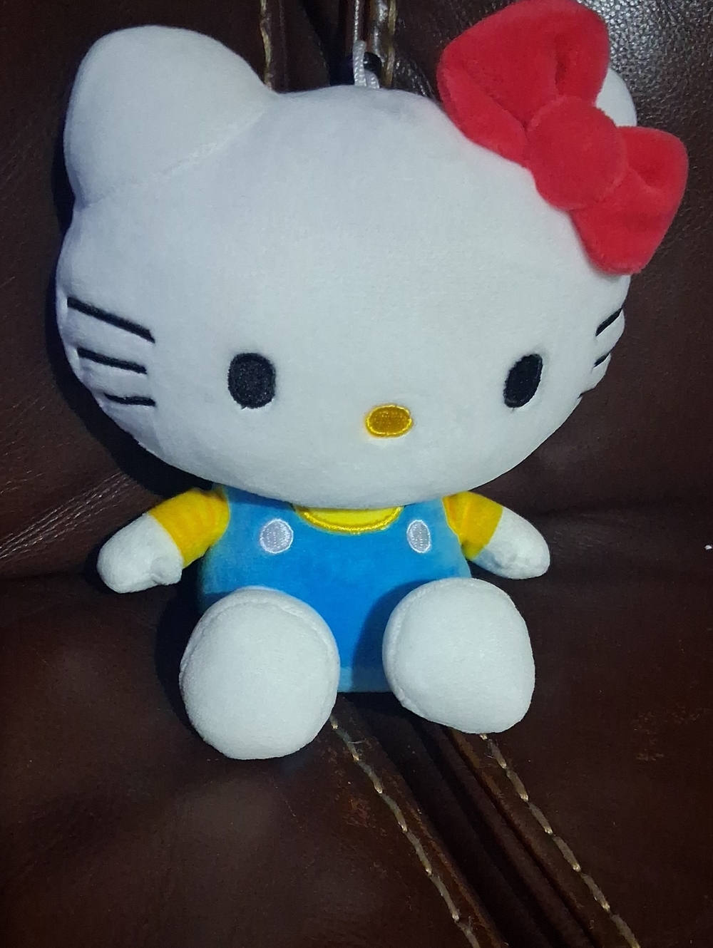 Hello Kitty® Bluetooth Plush White Plush Toy with Blue Outfit and Red Bow